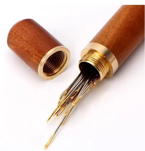 30-piece sewing needle set with wooden handle and metal needles, displayed on a white background.