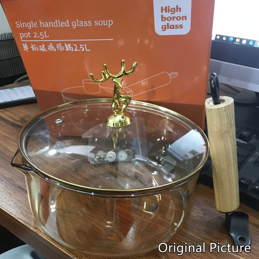 Heat-resistant glass saucepan with decorative gold lid