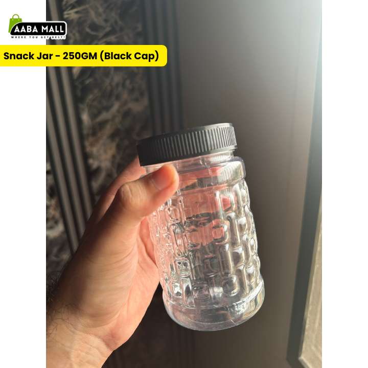A hand holding a 250GM clear plastic snack jar with a textured honeycomb pattern and a black ribbed cap, set against a dark background with a yellow text banner overlay.