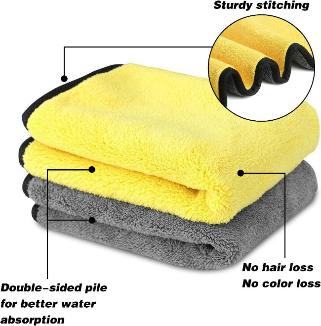 Two microfiber cloths, one yellow and one gray, with text highlighting features on a white background.