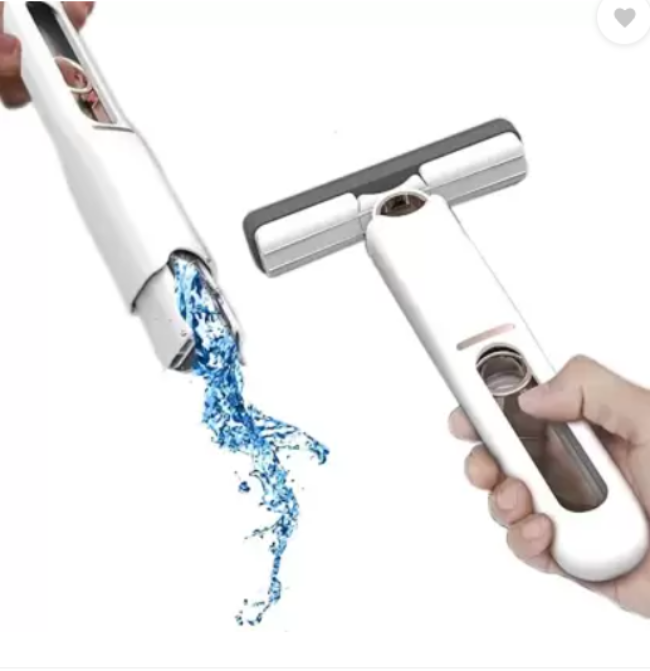 Mini portable self-squeeze mop with a white absorbent sponge head, shown using the folding mechanism to wring out water over a sink.