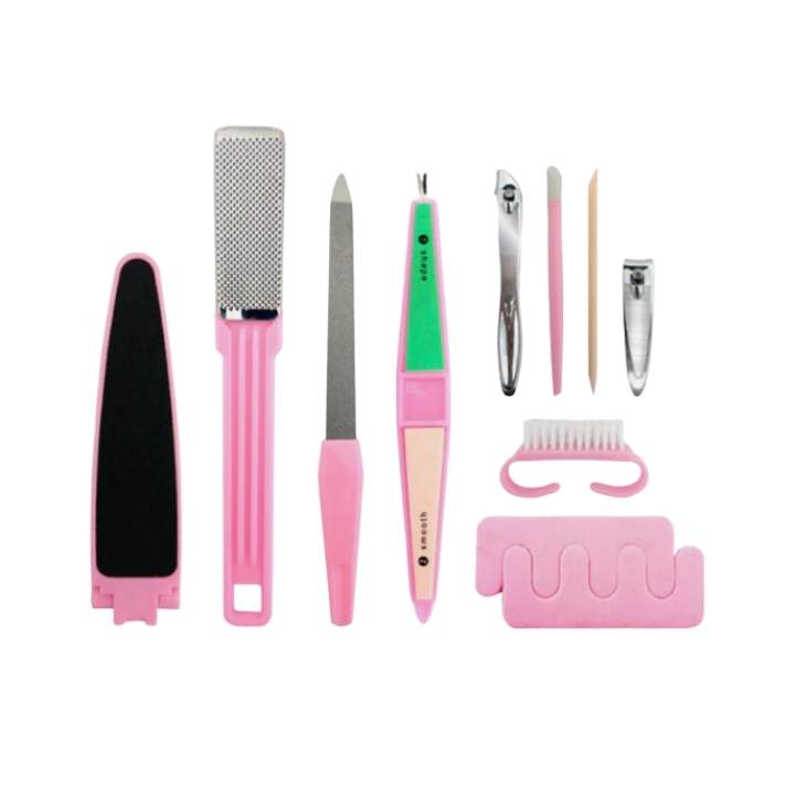 Set of nail care tools with pink handles on a white background
