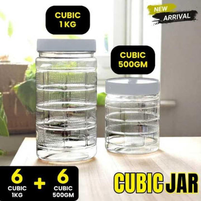 Two cubic jars with labels indicating capacity and new arrival on a blurred indoor background.