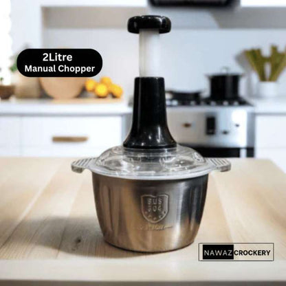 2Litre Manual Chopper on a kitchen counter with 'Nawaz Crockery' branding.