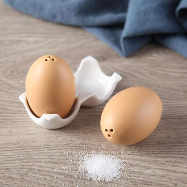 2 Pcs Ceramic Salt and Pepper Shaker Set with Egg-Shaped Ceramic Seasoning Jars and Carton Style Holder for Kitchen Dining Table Decor