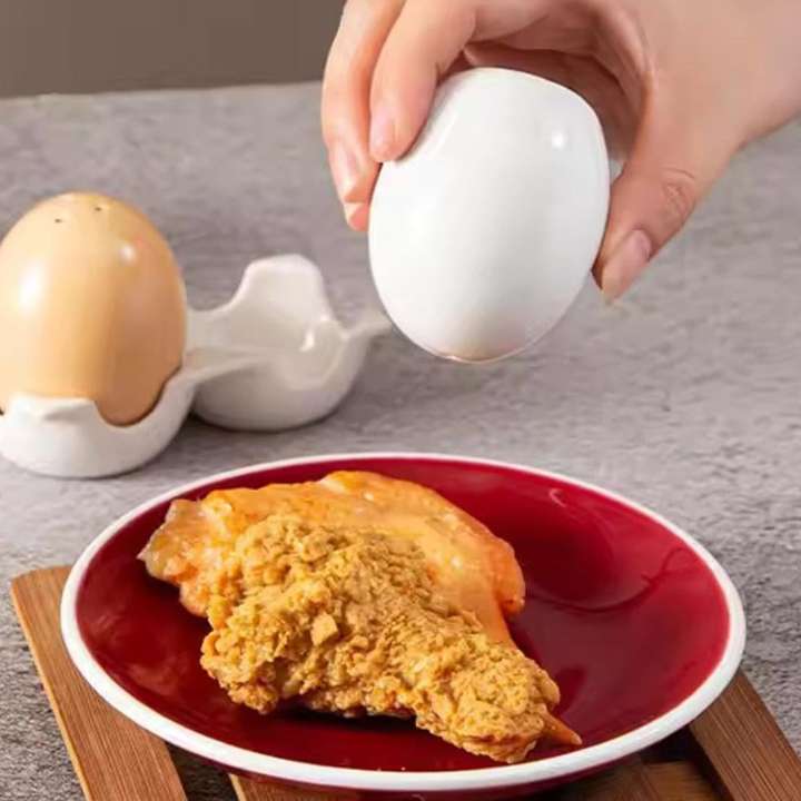 2 Pcs Ceramic Salt and Pepper Shaker Set with Egg-Shaped Ceramic Seasoning Jars and Carton Style Holder for Kitchen Dining Table Decor