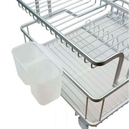 Metal kitchen cart with a trash can holder on a white background