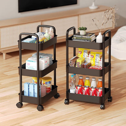 White 3-tier plastic rolling utility cart with handle, featuring 360-degree rotating wheels, holding vegetables and kitchen essentials.