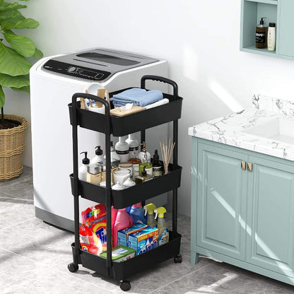 White 3-tier plastic rolling utility cart with handle, featuring 360-degree rotating wheels, holding vegetables and kitchen essentials.