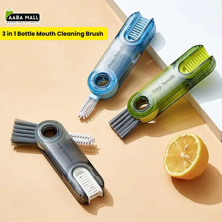 Three 3-in-1 bottle mouth cleaning brushes on a beige background with a lemon.