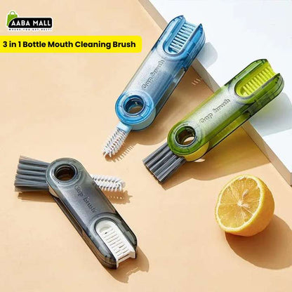 Three 3-in-1 bottle mouth cleaning brushes on a beige background with a lemon.