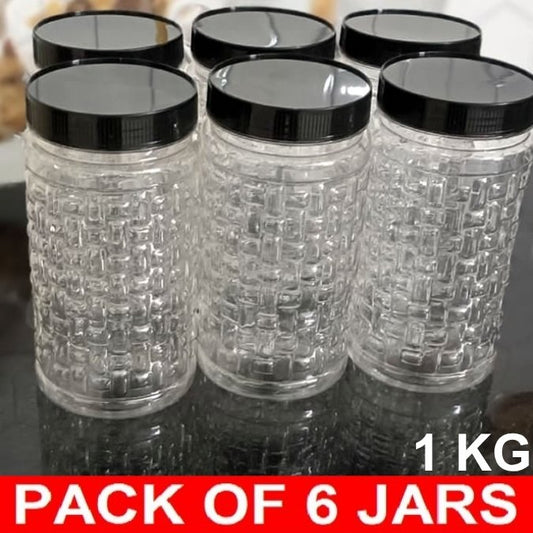 Pack of 6 clear jars with black lids on a reflective surface.