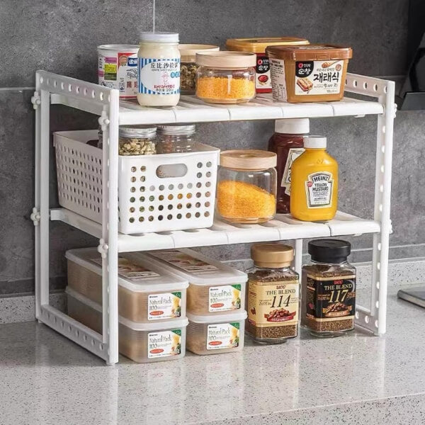 Kitchen storage rack with various food items on a countertop