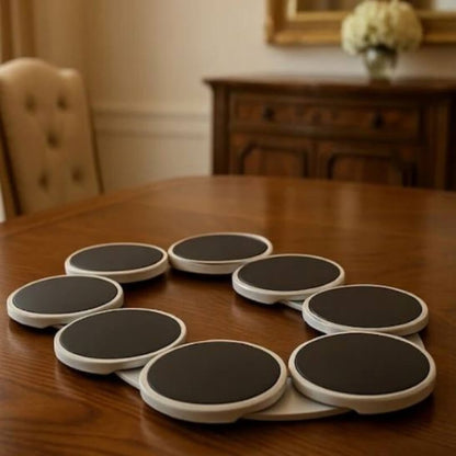 Set of round coasters on a wooden table with a blurred background