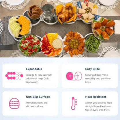 Diverse food items on a table with features of expandable, easy glide, non-slip surface, and heat resistant trays displayed below.
