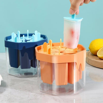 Popsicle mold with a popsicle being removed, set against a light blue background.