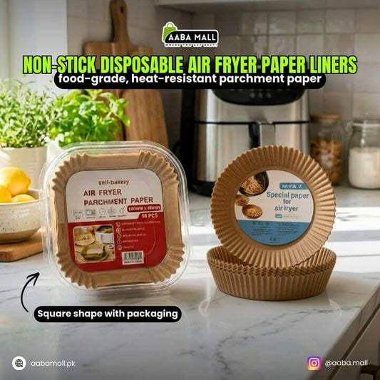 Non-stick disposable air fryer paper liners with packaging on a kitchen counter.