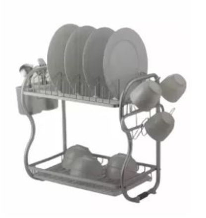 A silver 2-tier aluminum dish drying rack with a utensil holder and black drip tray, fully loaded with plates and bowls on a kitchen countertop.