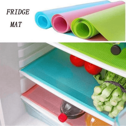 Colorful refrigerator mats with a close-up of a green mat on a refrigerator shelf.