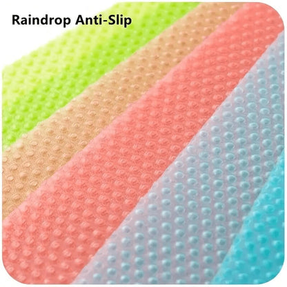 Colorful anti-slip mats with 'Raindrop Anti-Slip' text on a white background