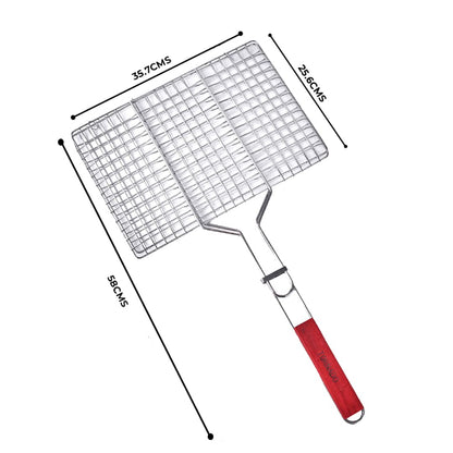 A non-stick metal BBQ grill basket with a long, light-colored wooden handle, shown closed and ready for grilling vegetables or fish.
