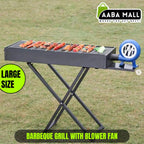 A black portable charcoal BBQ grill with a stand, showing the side-mounted manual hand-crank blower fan integrated into the unit.