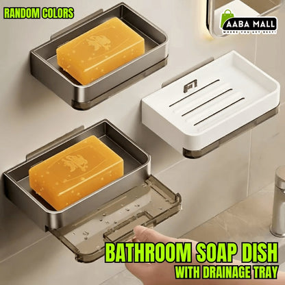 Bathroom soap dish with drainage tray holding a bar of soap, with 'AABA MALL' branding.