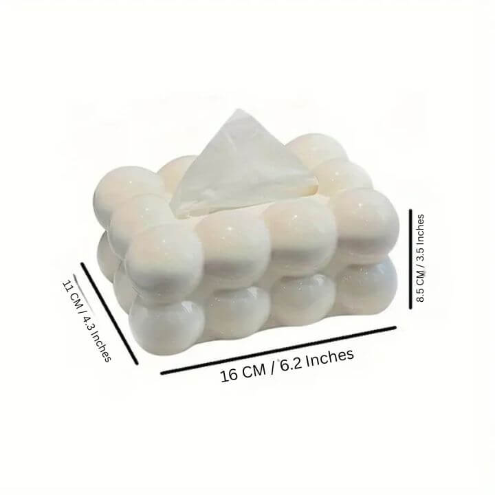 White foam block with a pyramid on top, showing measurements on a white background