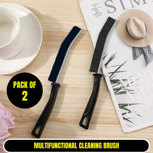 Set of two hard-bristled detail cleaning brushes with ergonomic handles, one being used to scrub white bathroom tile grout to show effectiveness.