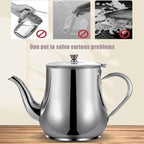 Stainless steel teapot on a wooden surface with promotional text about its multifunctional use.