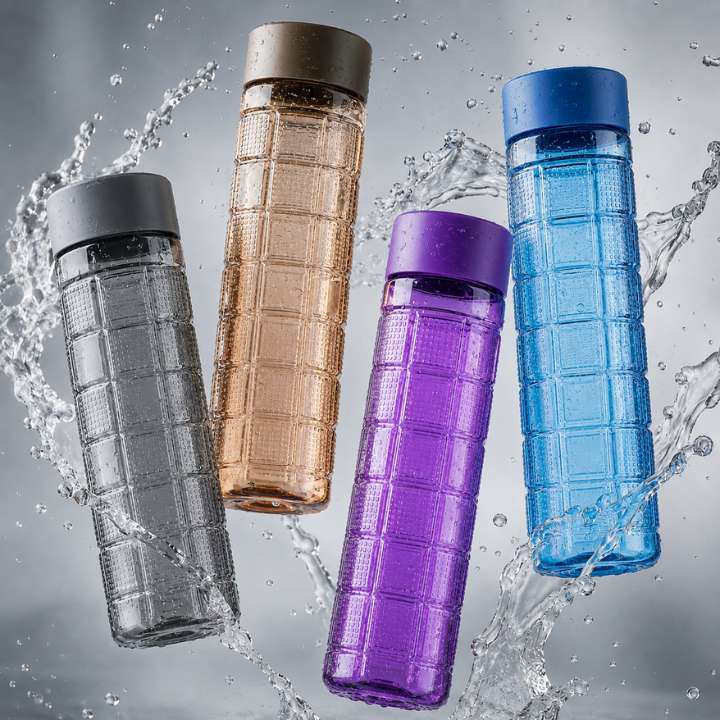 Four grid-patterned water bottles in gray, brown, purple, and blue with water splashes on a gray background.