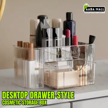 Desktop drawer-style cosmetic storage box with makeup items on a neutral background, featuring the brand 'AABA MALL'.