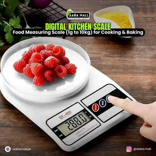 Digital kitchen scale with raspberries on a wooden surface, featuring Aaba Mall branding.