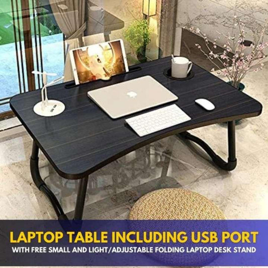 Black laptop table with USB port in a home office setting