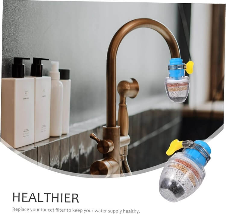 Twin faucet water filter attachments on a kitchen sink with cleaning products in the background.