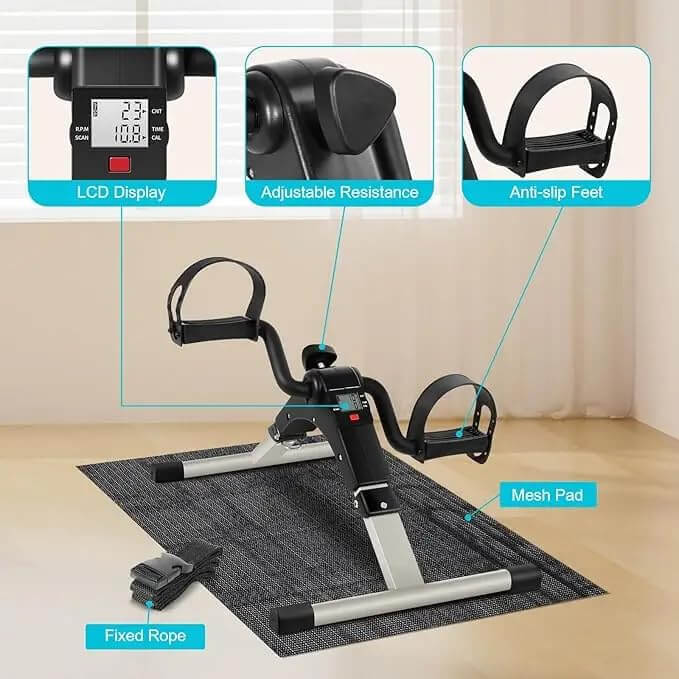 Mini exercise bike with features highlighted on a neutral background