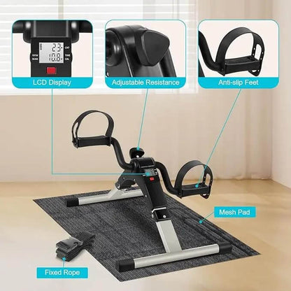 Mini exercise bike with features highlighted on a neutral background