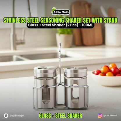 Stainless steel seasoning shaker set with stand on a kitchen counter