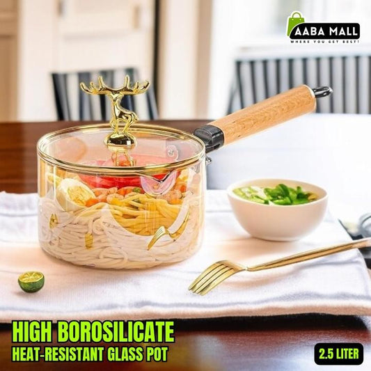 Heat-resistant glass saucepan with decorative gold lid