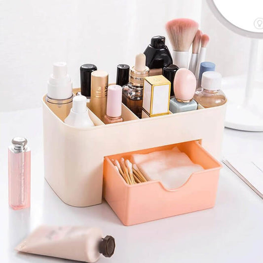 Makeup organizer with various cosmetic items on a white surface