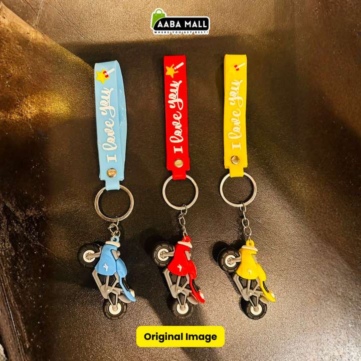 Three motorcycle keychains with colorful straps in light blue, red, and yellow, each featuring 'I Love you' text and a small motorcycle charm in matching colors, displayed on a dark textured surface.
