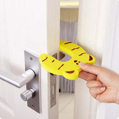 Childproof cow type door stop for baby safety