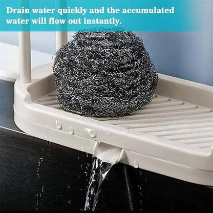 Scrubber on a draining rack with water flowing out, text indicating quick drainage.