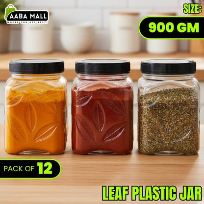 Three glass jars with black lids containing different leafy substances on a wooden surface, with branding and product details displayed.