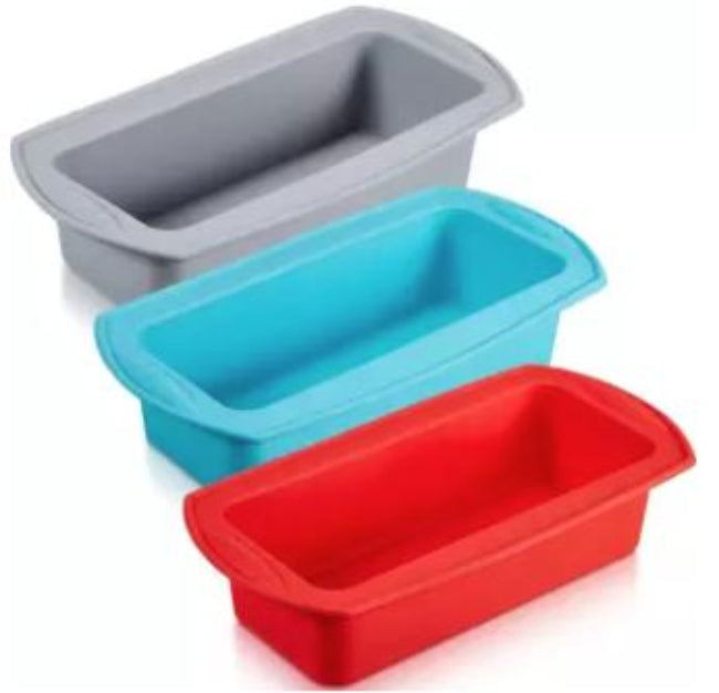 Flexible non-stick silicone loaf pan in red, shown holding a baked banana bread loaf that is easily being removed from the mold, illustrating the easy release.