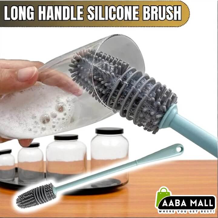 Long handle silicone brush being used to clean a bottle with AABA MALL branding.