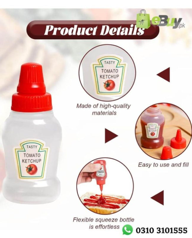 Set of two clear mini squeeze condiment bottles, one filled with red ketchup and one with white mayonnaise, next to a packed lunch box.