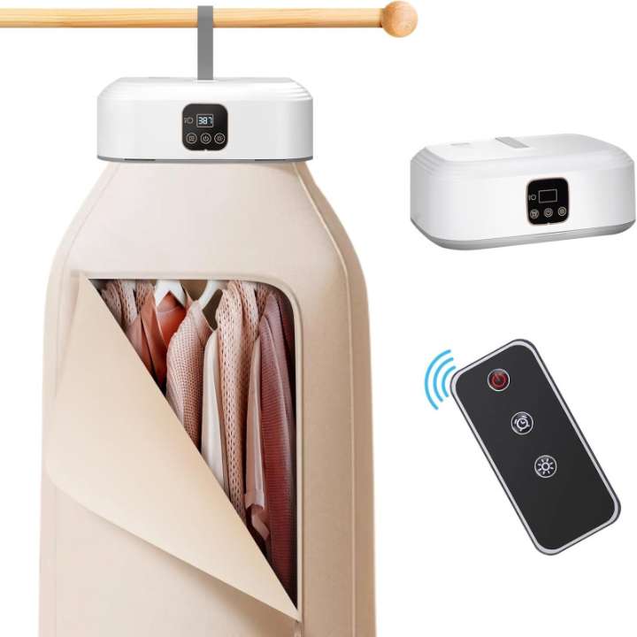 Portable clothes dryer with remote control on a white background