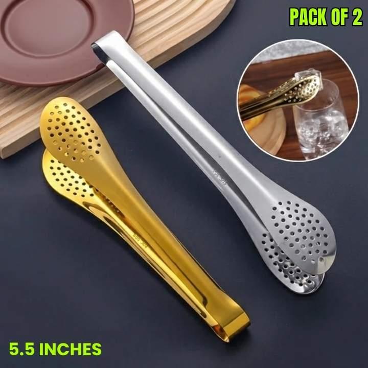 Two pairs of tongs, one gold and one silver, on a dark surface with an inset showing their use.