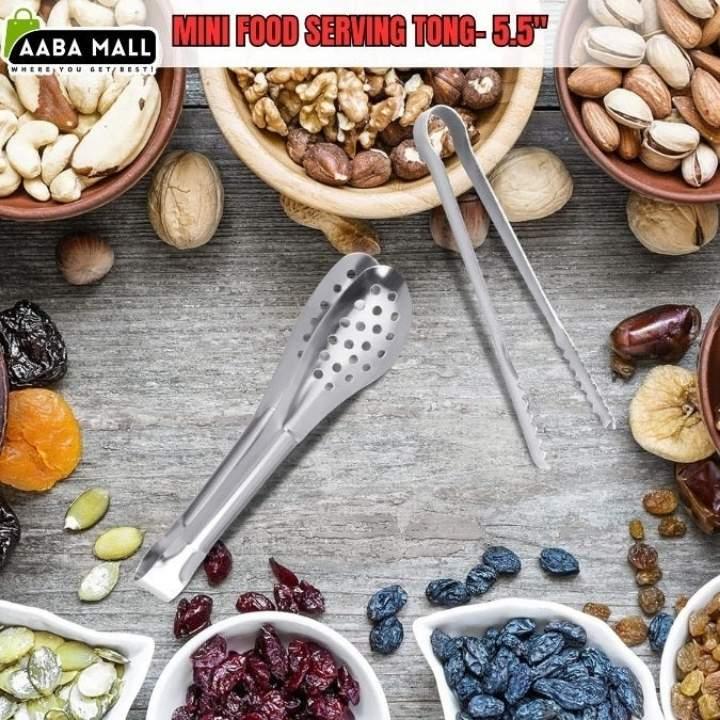 Mini food serving tong with nuts, seeds, and dried fruits on a wooden surface, featuring AABA MALL branding.